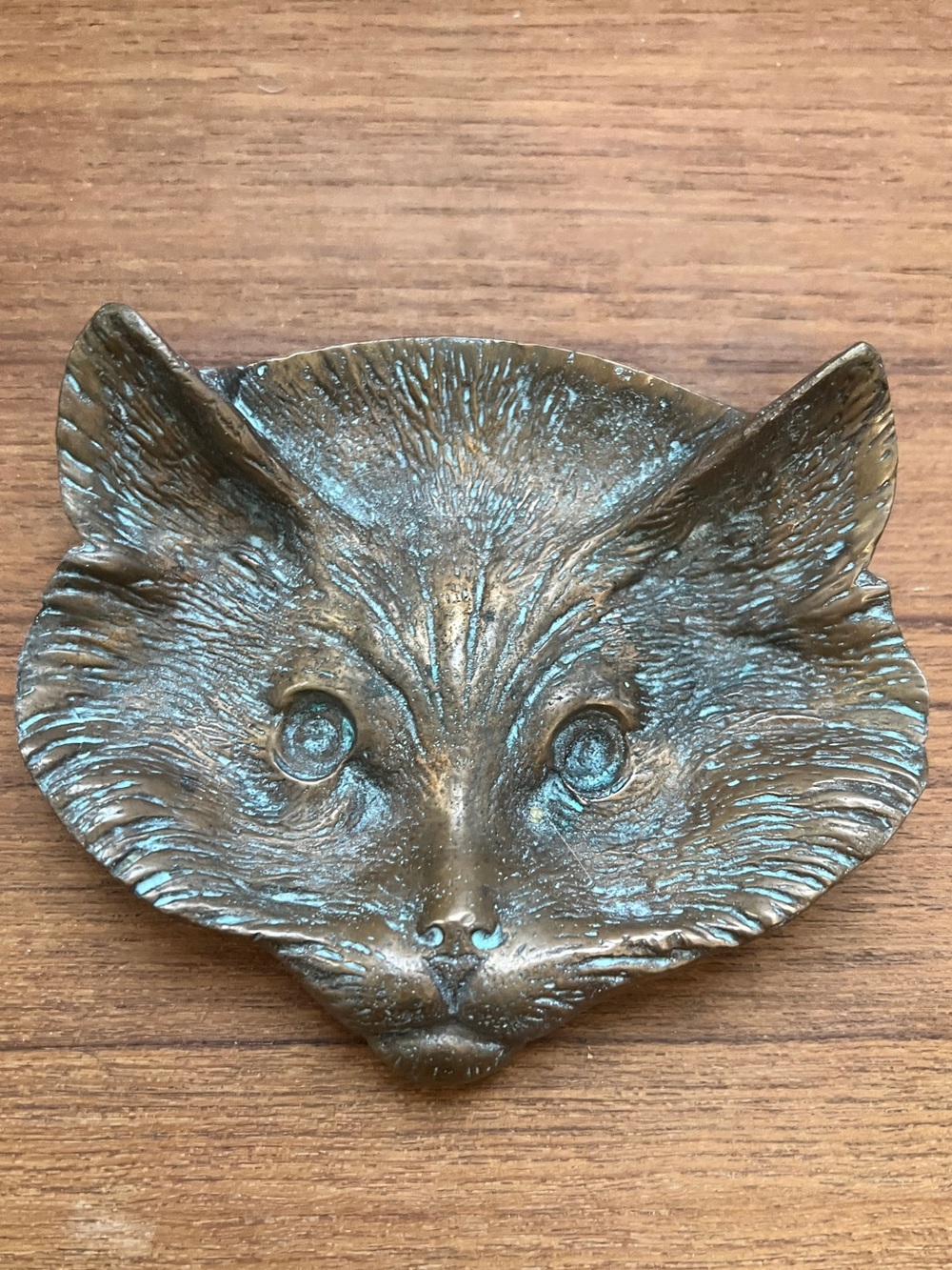 Vintage solid brass cat face trinket dish or ashtray.